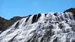 waterfall cascades from below